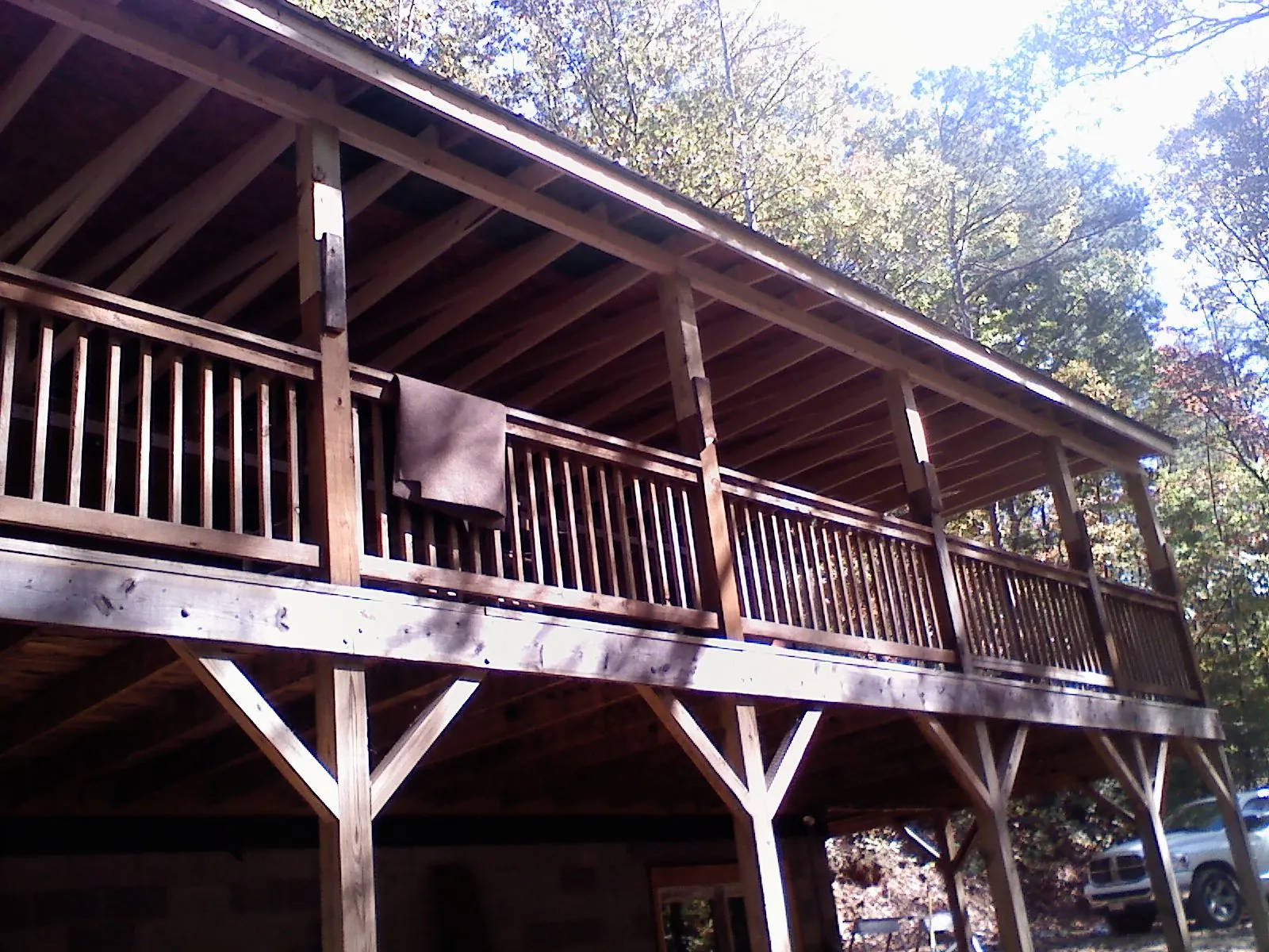Timber framing under a new elevated porch and deck — Roof Leak Repair in Jefferson City by Roofing Brothers